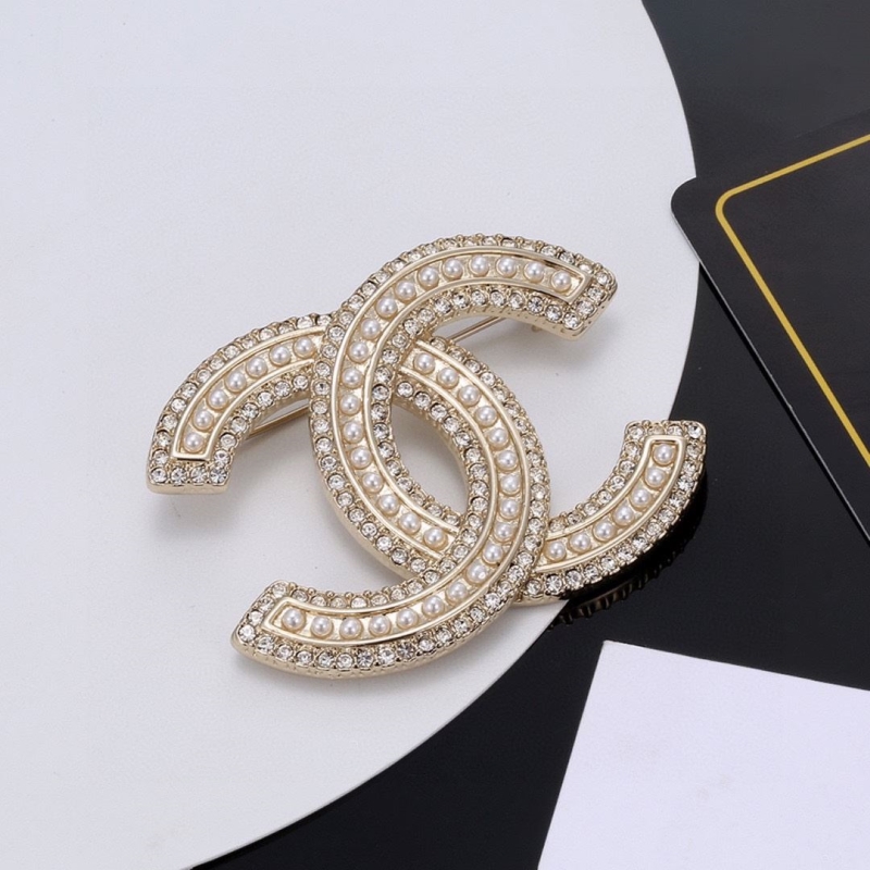 Ch**el brooches